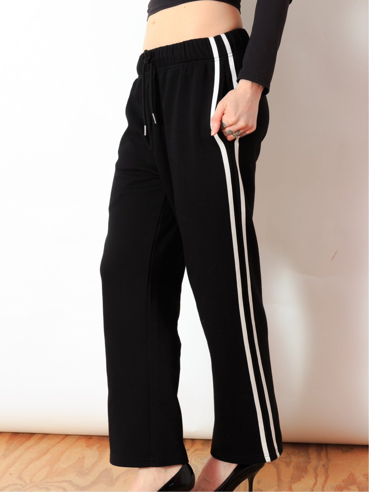 Black tracksuit bottoms with white stripe shop